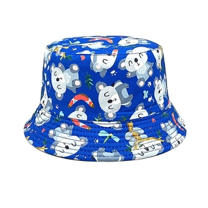 Detail of navy blue kids bucket hat with cute koala print made of cotton canvas