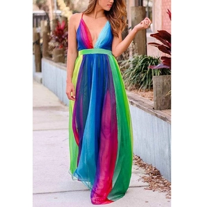 Detail of deep V-neckline and colorful rainbow chiffon fabric on a flowing maxi dress