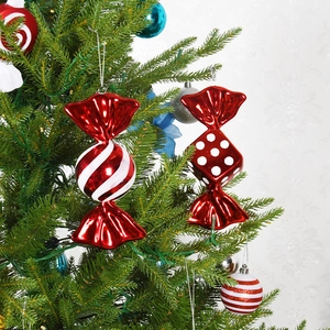 18cm red and white painted Christmas candy and dice ornaments hanging on a green tree