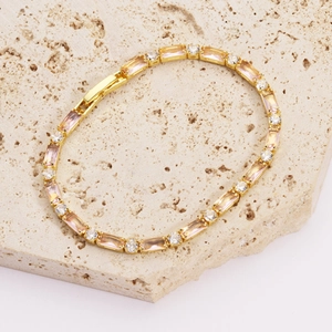 Elegante bracciale tennis placcato in oro con pietre di zircone rosa e cristalli micro-pavé