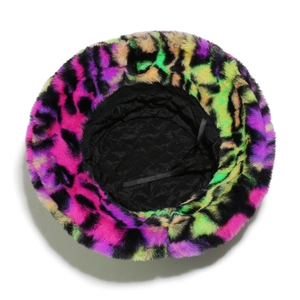 Overhead detail of plush faux fur bucket hat with colorful leopard print and quilted lining