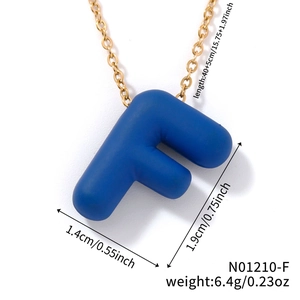Detail view of blue letter F necklace pendant with precise size and weight measurements