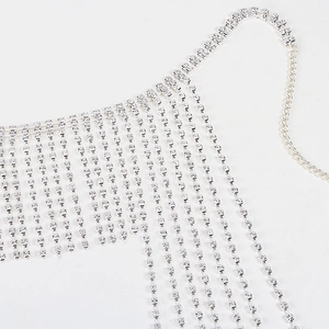 Close-up of sparkling silver rhinestone tassel chains with exquisite craft details