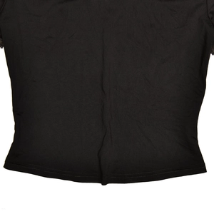 Detailed view of the lace hemline and fabric texture on a black short sleeve top
