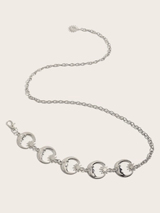 Chaîne de taille en métal argenté avec des pendentifs en forme de lune et de soleil