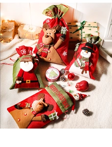 Detailed view of plush Christmas drawstring gift bags with Santa, Elk, and Snowman 3D decor