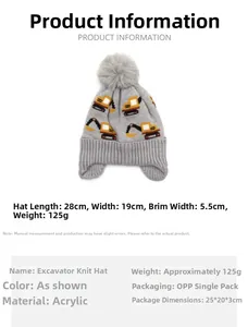 Detail showing the gray knitted hat with cartoon excavator design and size measurements