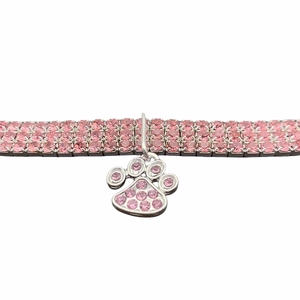Detailed view of pink three-row rhinestone pet collar with a cute paw print pendant