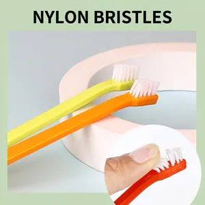 Dual pack of soft nylon cat and dog toothbrushes with a triangular head for pet oral care