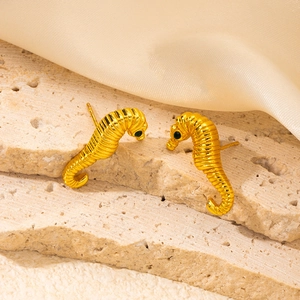 French vintage style gold seahorse stud earrings with green zircon eyes on stone