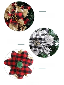 Close-up of 14cm plaid Christmas flowers with glitter edges and mounting base