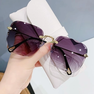 Fashionable rimless square sunglasses with gradient purple lenses and golden metal frame
