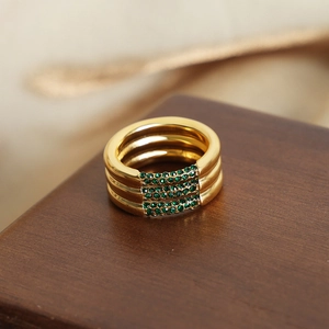 Luxury triple-layered gold-plated titanium steel ring with green zircon crystal accents