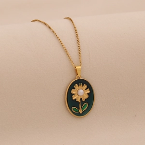 Vintage stainless steel oval necklace with green enamel sunflower and pearl pendant