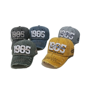 Distressed vintage cotton baseball caps with 1985 embroidery in five classic colors