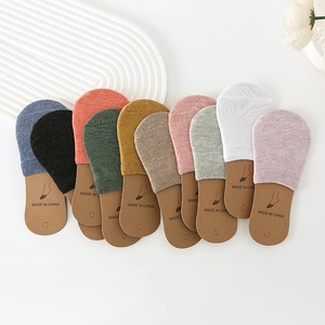 Flat lay of colorful cotton invisible socks set in ten assorted colors for high heels