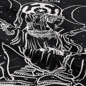 Macro shot of Moon Tarot tapestry fabric showing fine weaving and white silk screen printing