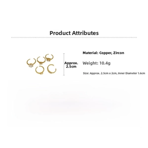 Detail showing five-piece gold copper ring set with zircon stones and 10.4g weight