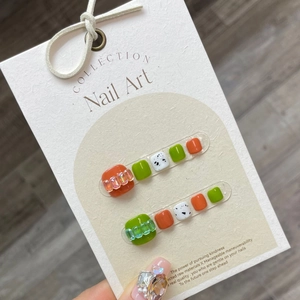 Handmade press-on toenails featuring summer color contrast and clear crystal accents