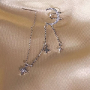 Elegant silver tassel star and moon ear cuff earring with sparkling crystal accents