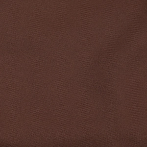 Macro shot of brown diagonal twill fabric texture showing fine weaving on lace-up top
