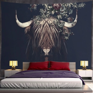 Artistic Highland Cow tapestry with vintage floral accents on a dark blue bedroom wall