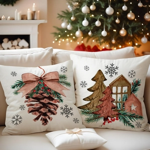 Close-up of linen Christmas pillow cover with pine cones, red berries and holiday patterns