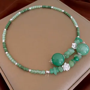 New Chinese beaded lotus necklace with jade-style green stones and silver floral charms