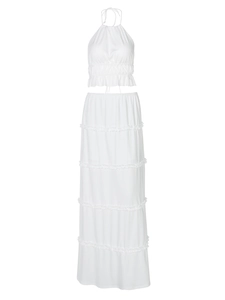 Chic white two-piece set with halter ruched top and tiered ruffle maxi skirt for women