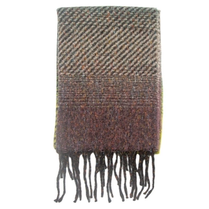 Detail of knitted winter scarf showing gradient texture, diagonal stripes and tassels