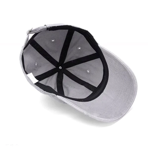 Close-up of the grey washed baseball cap interior showing black lining and metal buckle