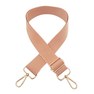 Detail of 3.8cm candy-colored adjustable bag strap with orange and white stripes