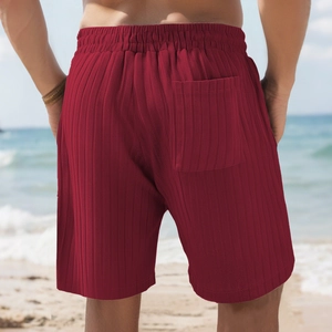 Men's dark red striped beach shorts with vertical knit texture and back pocket view