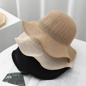 Detailed knit texture and wavy brim of women hollow sun hats in black, beige and camel
