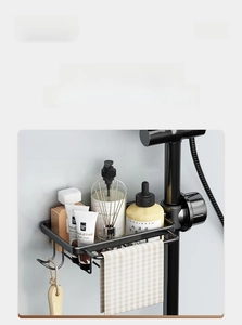 Detail of black stainless steel faucet storage rack with hooks and towel bar for drainage