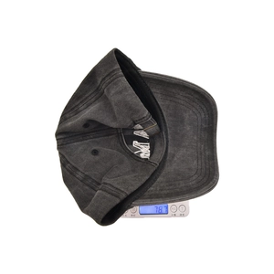 Vintage dark gray MAMA MINI baseball cap with white embroidery on weighing scale