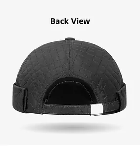 Rear view of black quilted docker cap with silver metal buckle and diamond stitching