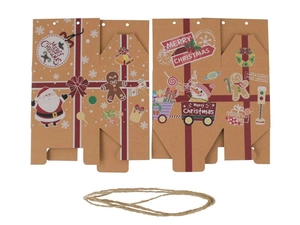 Flat lay of Christmas kraft paper gift boxes with festive patterns and jute twine