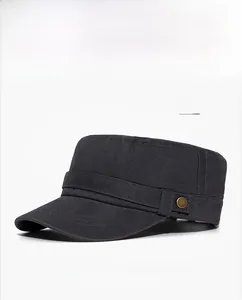 Detail of grey washed cotton cadet cap featuring vintage bronze button and twill texture