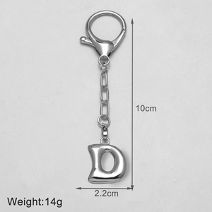 Detail view of silver letter D keychain showing 10cm total length and 2.2cm pendant width