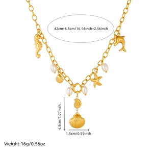Gold ocean theme necklace with starfish, seahorse pendants and white pearls on white background