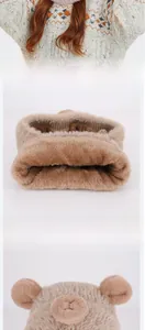 Detail of plush capybara neck warmer with soft brown fur and knit lining for kids