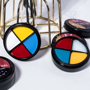 Top view of solid nail gel palettes in red, yellow, blue and white colors, 4g pots