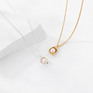 Minimalist S925 silver and gold irregular shell pearl necklaces set on white stones