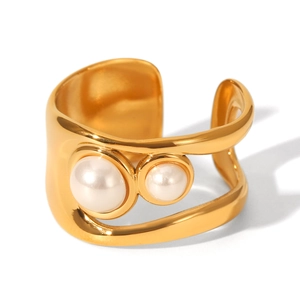 Detailed view of adjustable gold-plated ring with dual asymmetrical white pearls