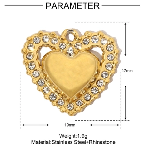 Detailed view of gold heart pendant with rhinestones including precise size measurements