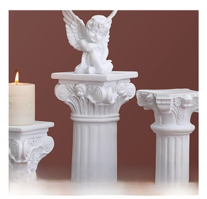 Detailed view of white Roman column base and angel sculpture set for elegant home decor