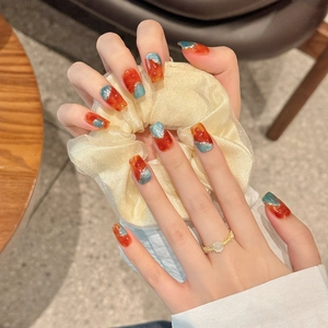 Artistic amber and teal marble press-on nails with silver glitter in square shape