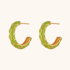 Detail of light green enamel C-shaped earrings with 18K gold-plated grid pattern