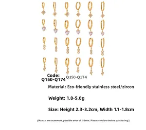 Detail view of 18k gold plated stainless steel hoop earrings with zircon charms
